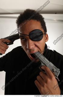 12 2018 01 GARSON STANDING POSE WITH GUNS SUICIDE